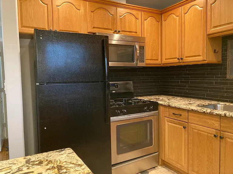 Apartment 18 refrigerator, gas range and microwave