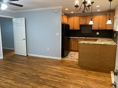 Apartment 18 living area opening to the kitchen