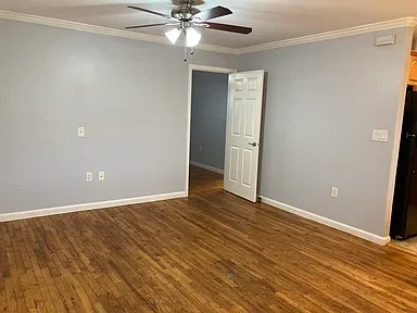 Apartment 18 living room with hardwood flooring