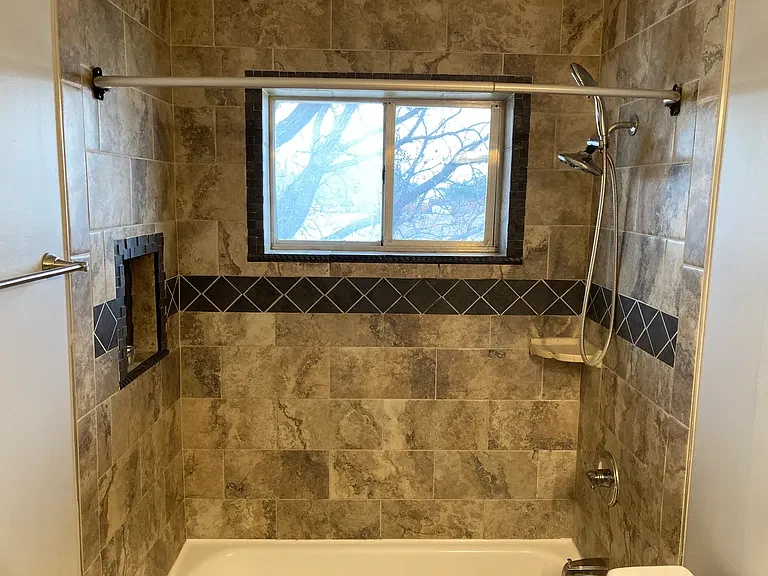 Apartment 18 shower and bathtub
